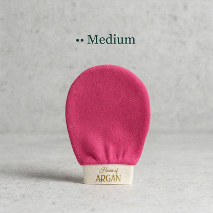 House of Argan fuchsia Moroccan kessa glove for medium body exfoliation, displayed upright on a neutral background
