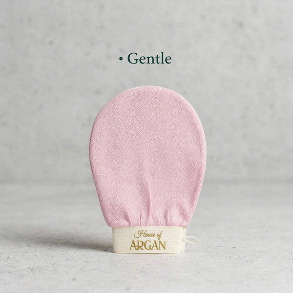 House of Argan pink Moroccan kessa glove for gentle body exfoliation, displayed upright on a neutral background
